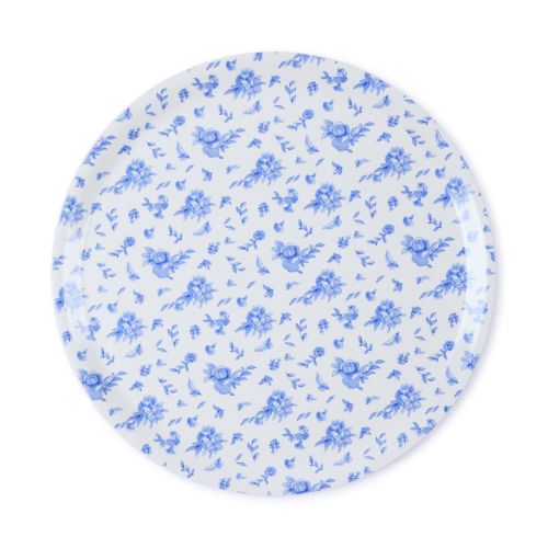 Round white tray with blue illustrated flowers, petals and leaves covering the entire tray.