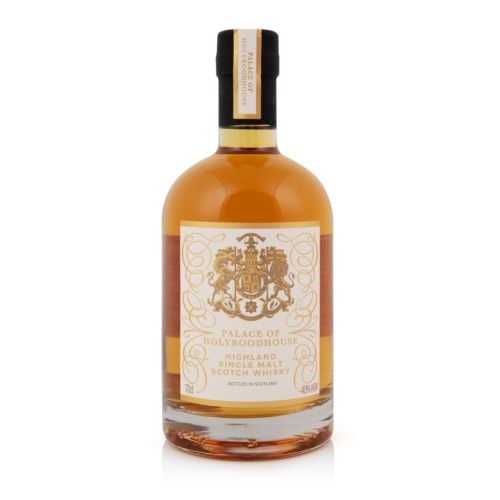 Bottle of whisky with white and gold label. Royal Coat of Arms and information written on label. 
