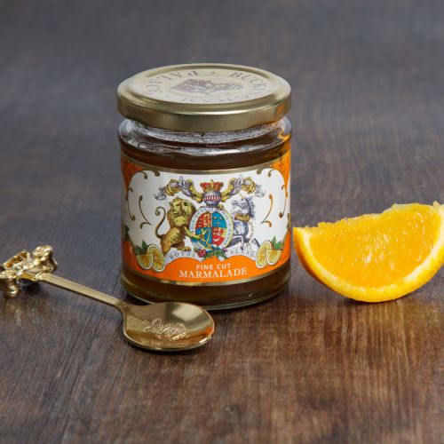 glass jar of fine cut marmalade with a Buckingham Palace royal crest label round the jar 