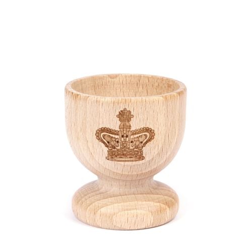 Wooden egg cup with crown design