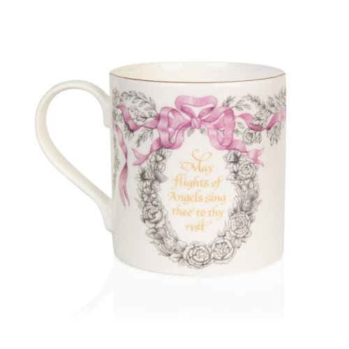 Front of coffee mug with Queen Elizabeth II's personal cypher. Surrounded by a floral design and pink ribbon.