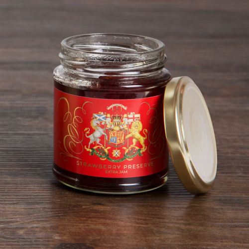 Glass jar with red label featuring Scottish coat of arms