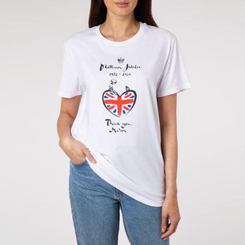 White t-shirt featuring a heart with a union jack inside. On top of the heart is an illustration of a little boy and a mole. Above that are the words 'Platinum Jubilee 1952-2022' and a crown. Underneath the heart are the words 'Thank you, Ma'am'