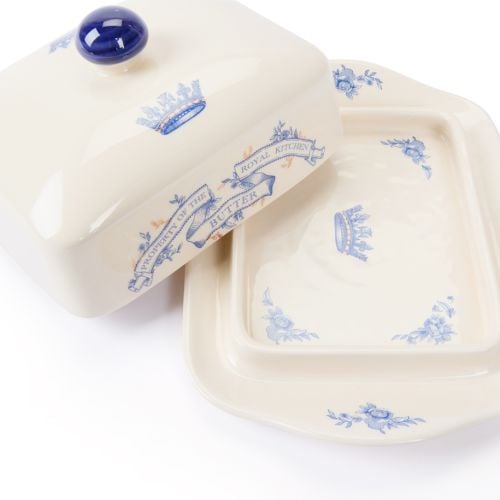 Cream earthernware butter dish with blue typeface on banner stating property of the Royal Kitchen