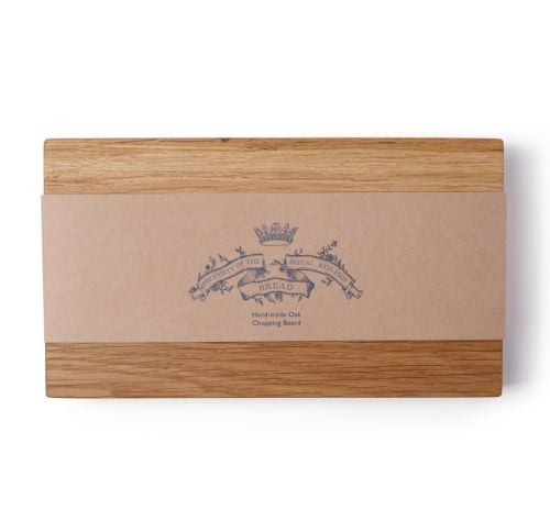 Oak chopping board embossed with property of the Royal kitchen.