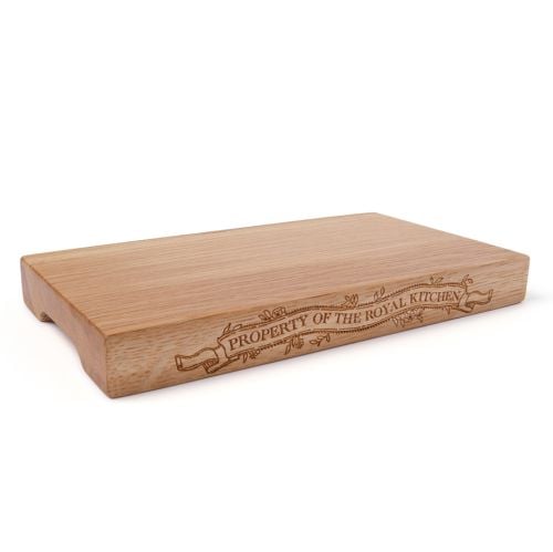 Oak chopping board embossed with property of the Royal kitchen.