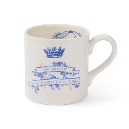 Cream earthenware mug with blue typeface and copper detailing stating property of His Majesty's kitchen.