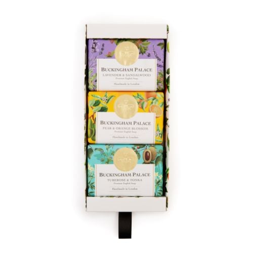 box of three  soap wrapped in floral printed papers and finished with a gold seal