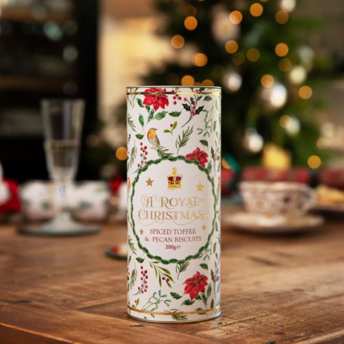 A tube of biscuits. Outer tube is decorated with winter foliage, robins and a crown. 