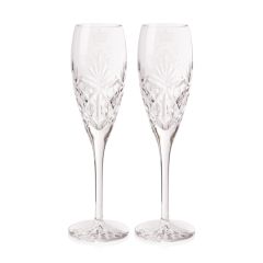 Two crystal champagne glasses etched with the Platinum Jubilee emblem