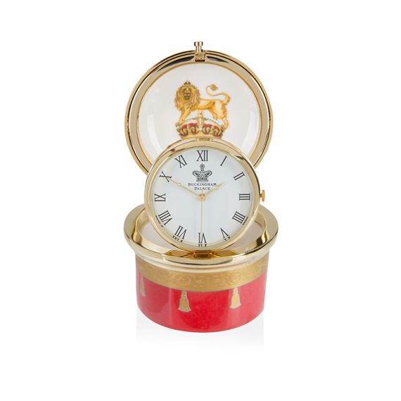 Open Coronation 1953 Limited Edition Pill Clock, featuring Clock face with Crowned Lion on interior lid in the background. Open Coronation 1953 Limited Edition Pill Clock, featuring Clock face with Crowned Lion on interior lid in the background.