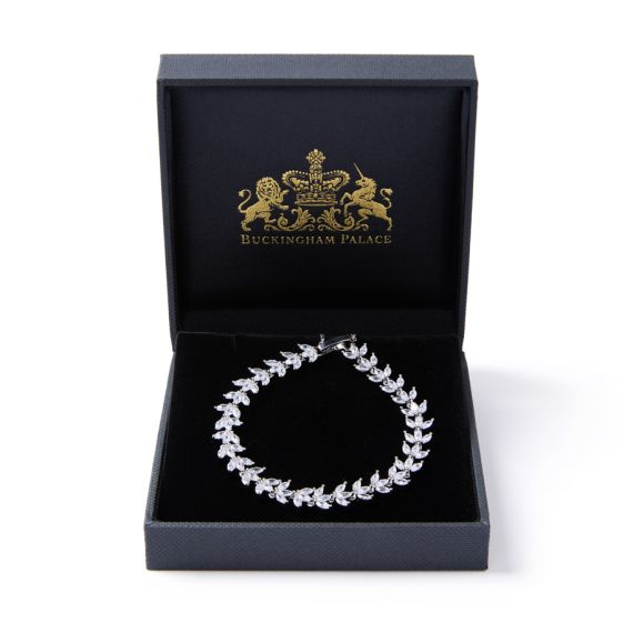 Leaf crystal studded bracelet in black presentation box featuring Buckingham Palace Crest 
