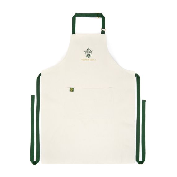 Cream cotton Windsor Castle Apron with green staps and Windsor Castle emblem at centre. Cream cotton Windsor Castle Apron with green staps and Windsor Castle emblem at centre.