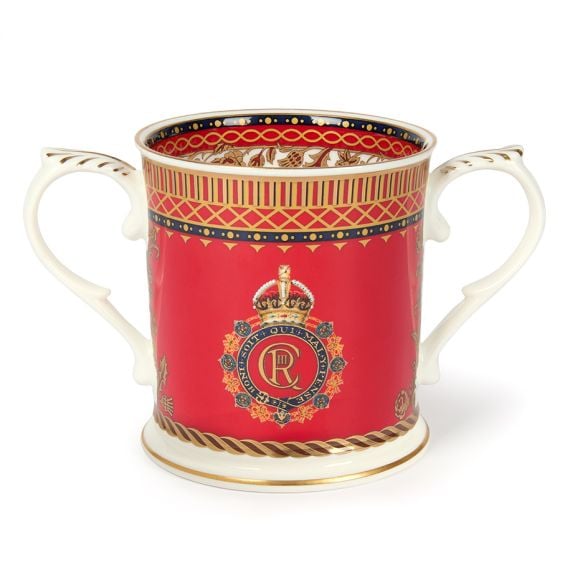 RM200 scarlet red Loving Cup with the cypher of His Majesty King Charles III  with gold band detail and two handles. 
