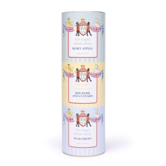 Tall set of three cylindrical “The Royal Sweet Shop” gift tin featuring three confectionery varieties—Rosey Apples, Rhubarb and Custard, and Pear Drops—stacked vertically with pastel-striped labels, a central crest, and decorative illustrations of guards,
