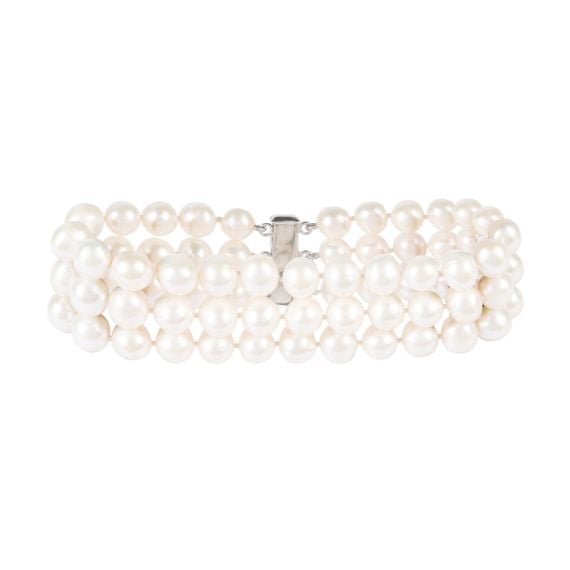 3-strand white pearl bracelet featuring lustrous freshwater pearls and a silver magnetic sliding clasp.

