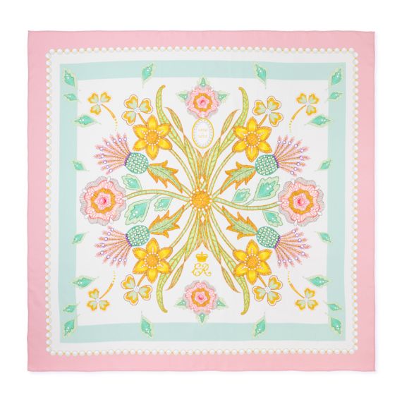 Square silk scarf with symmetrical floral design in pastel pink, yellow and green, framed by a pink border and pearl-effect trim motif.