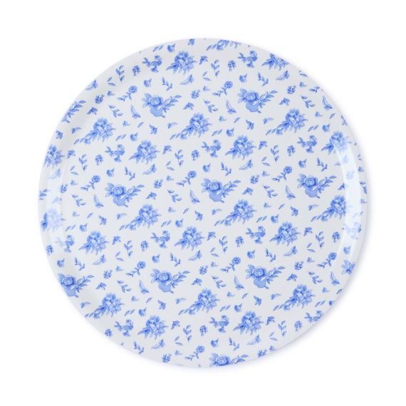 Round white tray with blue illustrated flowers, petals and leaves covering the entire tray. Round white tray with blue illustrated flowers, petals and leaves covering the entire tray.