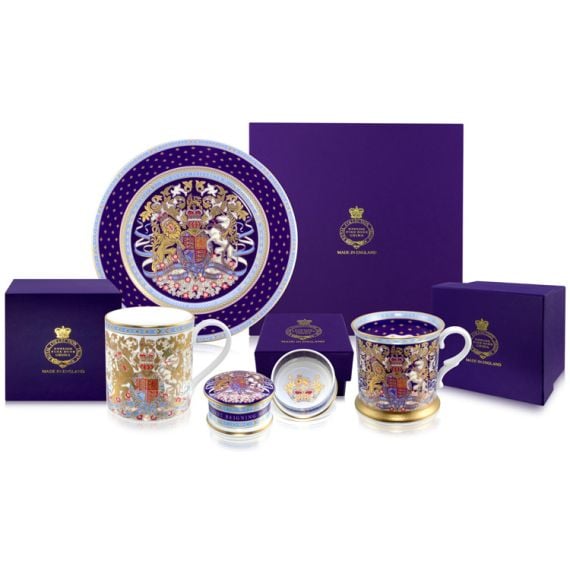 The longest reigning monarch collection including mug, tankard, pillbox and plate. The shot includes purple presentation boxes.