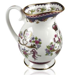Queen Victoria fine bone china cream jug with a design featuring Queen Victoria's name cipher surrounded by floral patterns and gold plated rims.