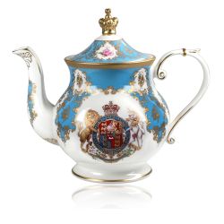 Royal coat of arms English fine bone china 6 cup Teapot featuring a lion and unicorn royal crest surrounded by ornated gold patterns and English flower patterns on a turquoise blue coloured background. The lid is topped with with a royal gold crown. 