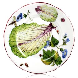 Chelsea Porcelain salad plate with a design featuring botanical patterns.
