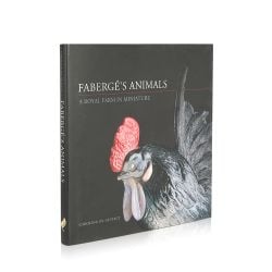 The front cover and open book view of Faberge's Animals, A Royal Farm in Miniature by Caroline de Guitaut.