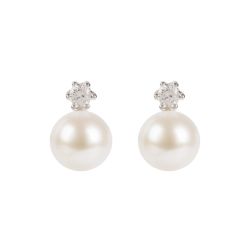 A pair of pearl stud earrings with a diamante attached to the top of the pearl