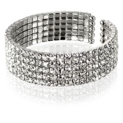 Royal Collection large crystal cuff bracelet featuring sprakling crystals embedded on palladium flexible base metal cuff. 