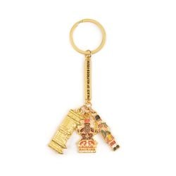 Gold coloured keyring with the facade of Palace of Holyroodhouse, Scottish arms and Scottish piper symbols