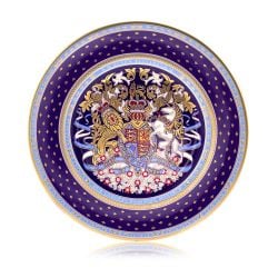 Side plate with a purple, gold and light blue design. With a lion and unicorn crest at the centre of the slide plate.