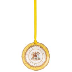 Miniature yellow plate with gold crown detail. It is  hanging from a yellow ribbon