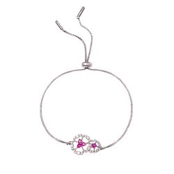 Silver bracelet with two floral details with a pink crystal centre