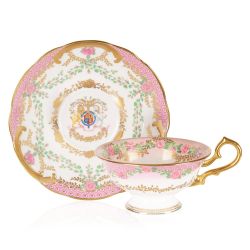 The design of this limited edition teacup and saucer is wonderfully inspired by the pink roses in bloom at the time of The Queen’s official birthday, on the East Terrace Garden, Windsor Castle. The saucer is stood behind the teacup and displays the specia