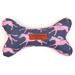Navy dog toy shaped as a bone and printed with pink horses and a Buckingham Palace leather tag