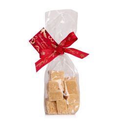 Clear bag of cubes of fudge tied with a red Buckingham Palace ribbon