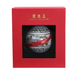 Fine bone English china bauble showing the facade of Buckingham Palace and tied with a red Halcyon Days ribbon