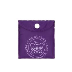 Purple shopping bag featuring The Queen's Jubilee 2022 emblem 