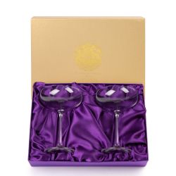 Pair of glass champagne saucers.