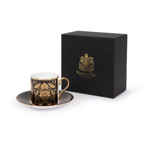 Acanthus Black coffee cup and saucer with gold detailing and handle.