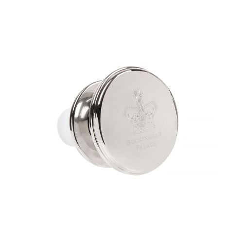A round silver BP wine Bottle stopper with Crown and Buckingham Palacae etched on int. 