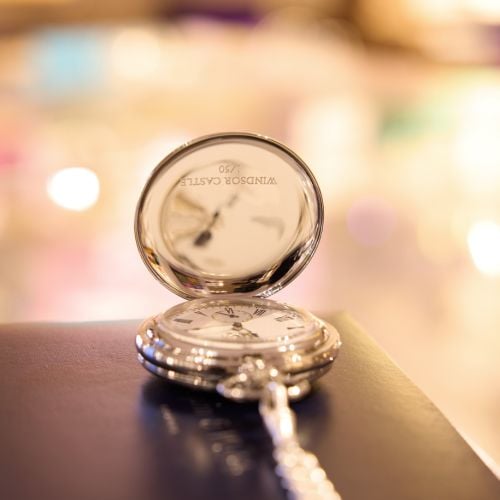 Detail of clockface of the Chrome Livery Pocket watch, featuring the insignia of King Charles III.
