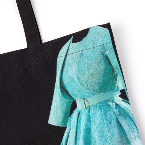 Her Life In Style exhibition black tote bag, featuring Norman Hartnell dress.