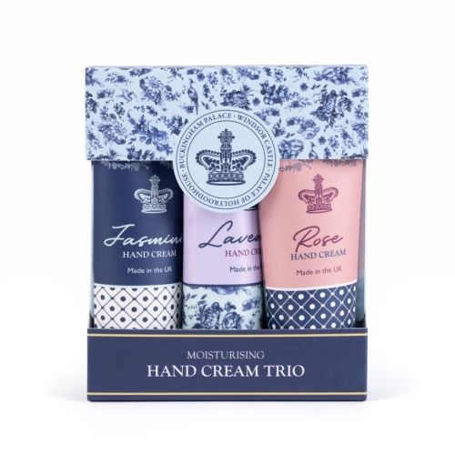 Three aluminium hand cream tubes in Jasmine (navy), Lavender (lilac) and Rose (pink) designs with crown motifs and “Made in the UK” branding.